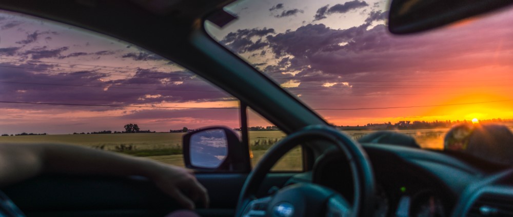 Driving Car w Sunset