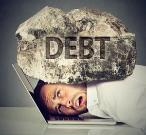 Man with a rock on him that says Debt